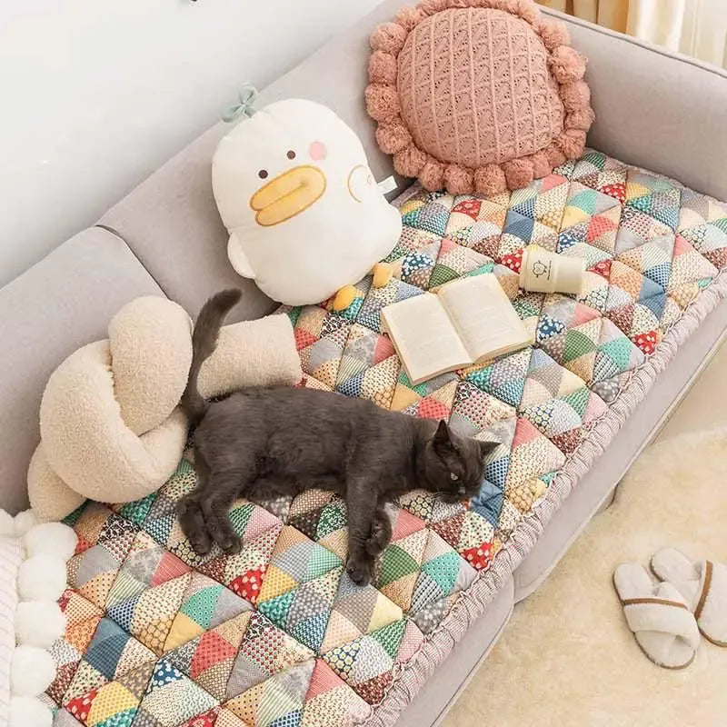 Sofa cover used as a large washable dog bed cover