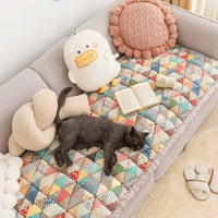 Sofa cover used as a large washable dog bed cover