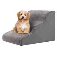 Dog stairs beside a sofa
